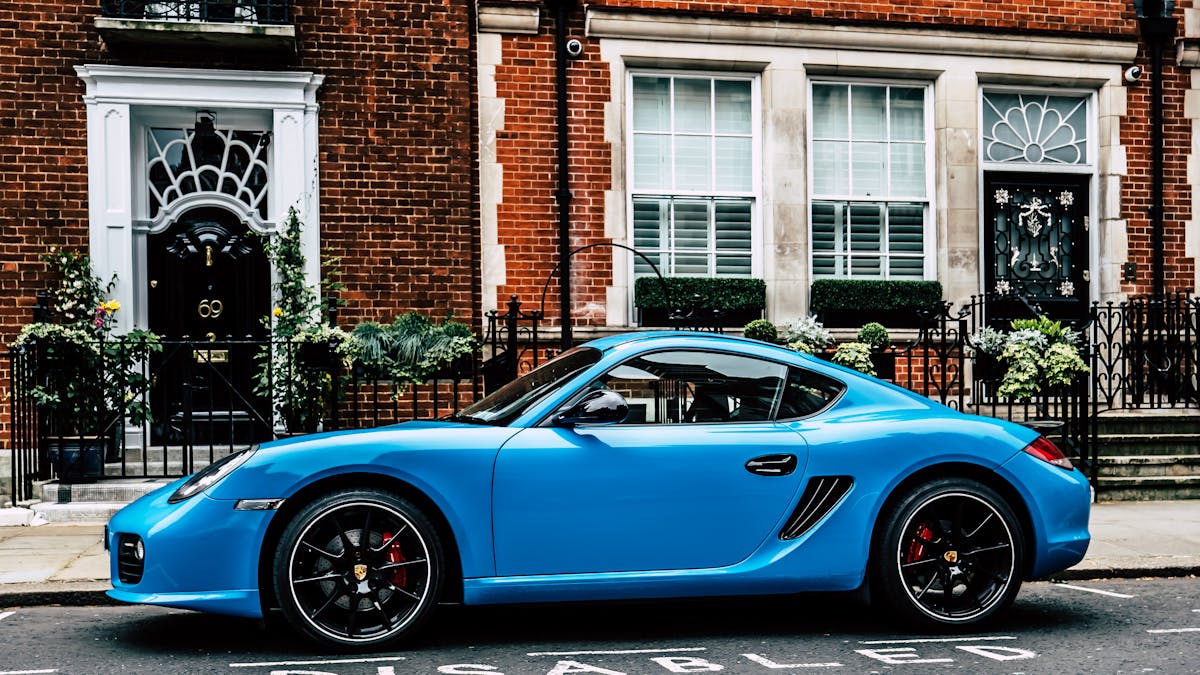 Blue Coupe on Road - Where to Stay in London