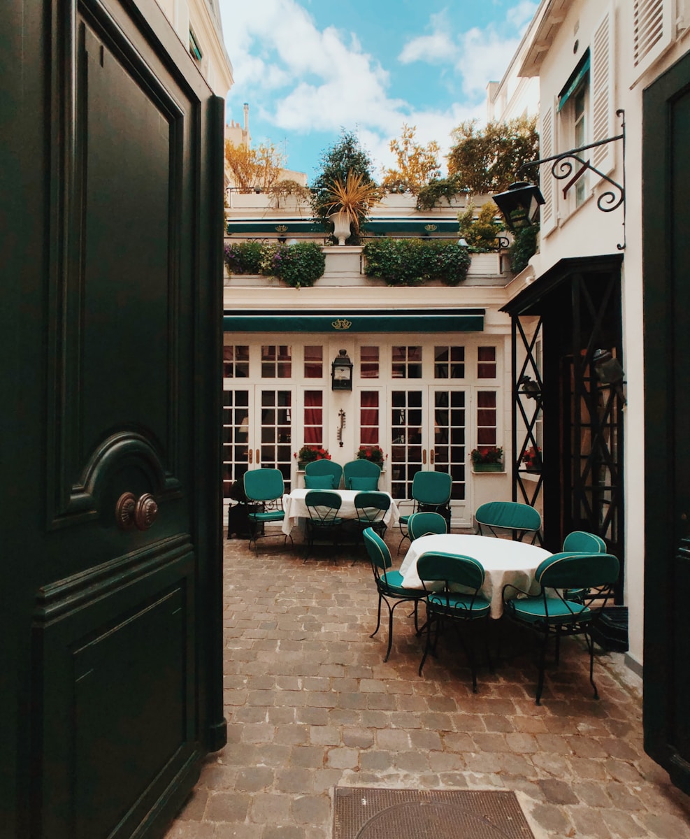 empty chairs and table - food and wine guide Paris