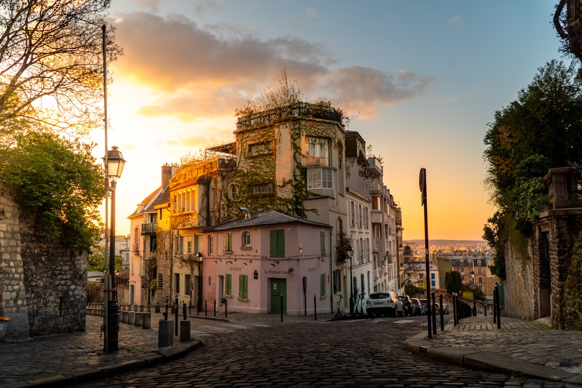 Montmartre Paris - people walking on street near white and brown concrete building during daytime