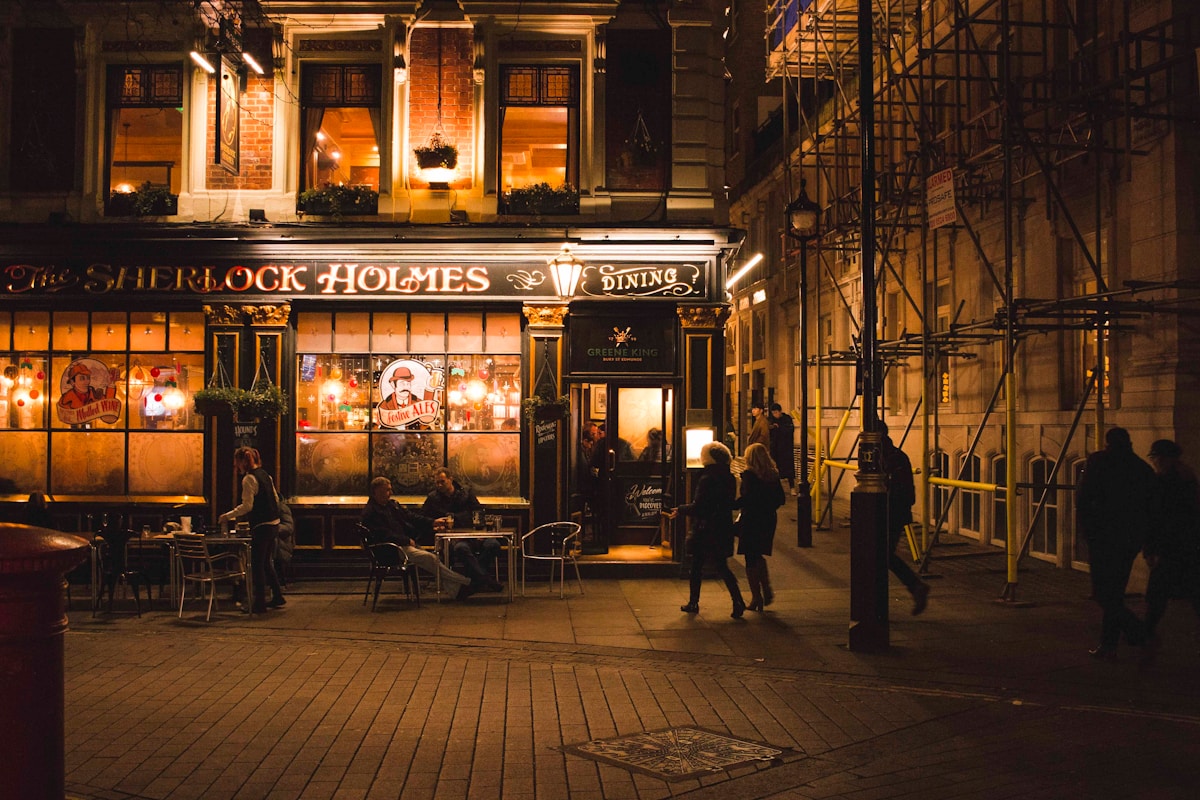 people walking beside road - London Hidden Gems