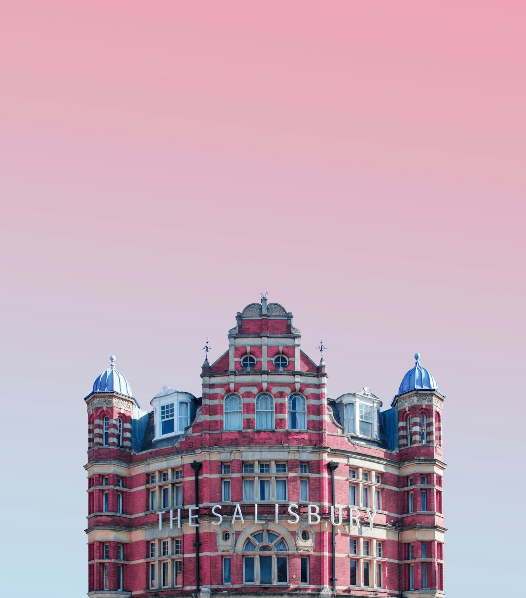 The Salisbury building under pink skies - visiting London for the first time