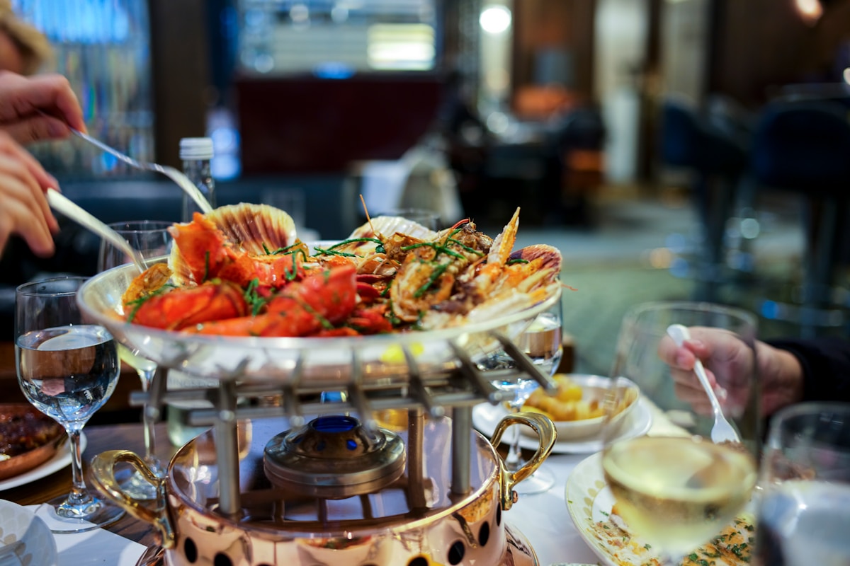 a plate of food on a table in a restaurant - London Food