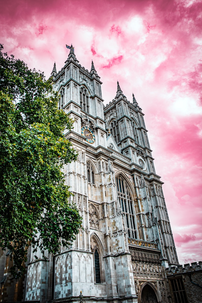 a large cathedral with a pink sky in the background - London Hidden Gems