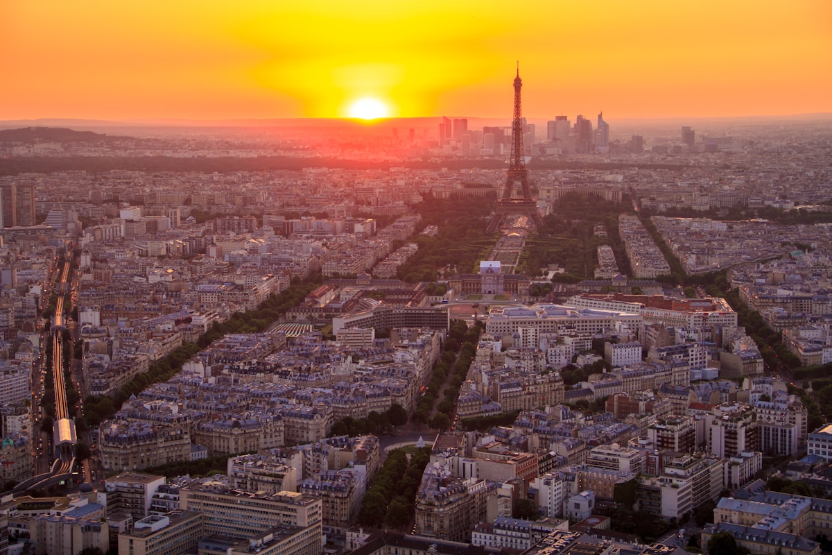 aerial photo of Eiffel tower during goldentime - Visiting Paris for the First Time