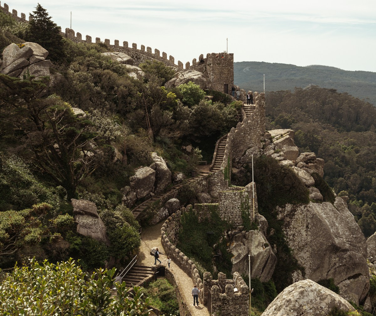 a stone castle on a hill - The Moorish castle in Sintra - Portugal