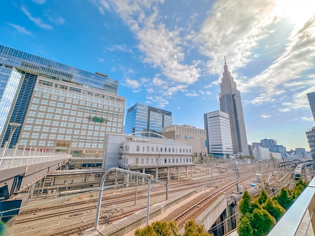 A panoramic view of a train track and buildings - Yoyogi, Shibuya City, Tokyo, Japan