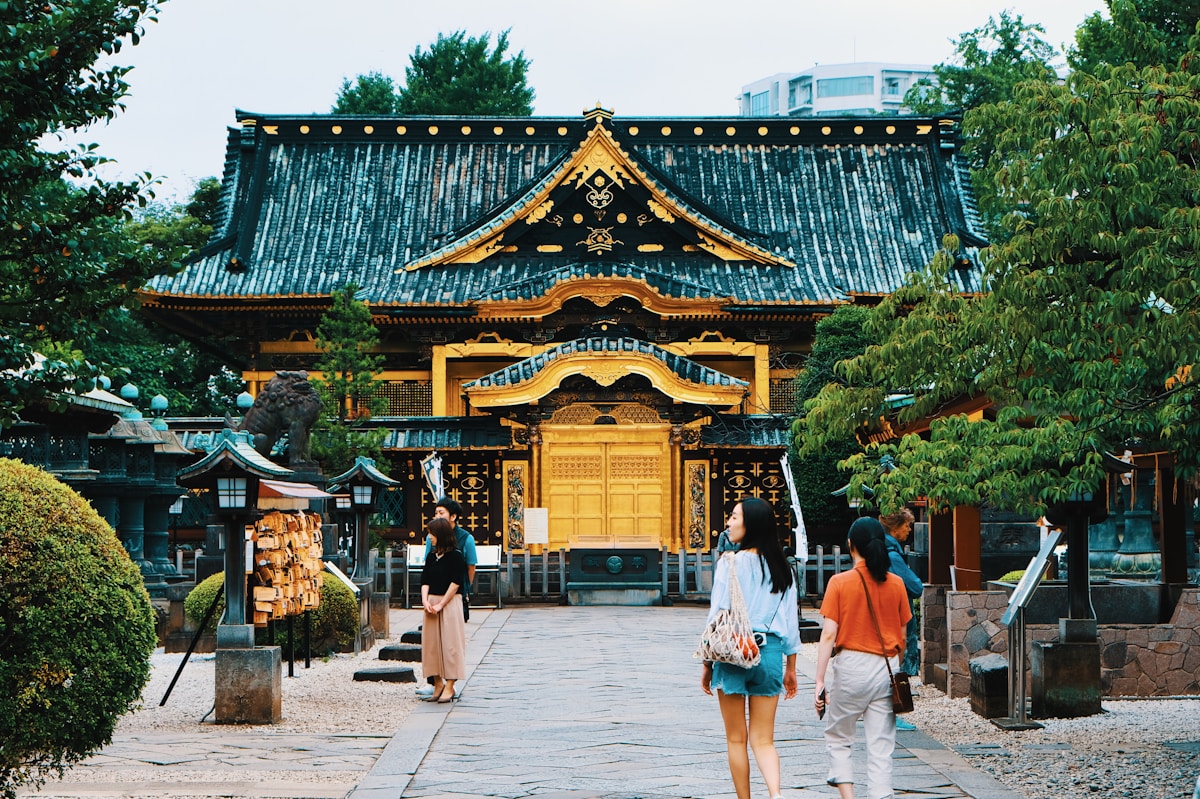 people near gold and blue temple during daytime - Ueno Park, Tokyo, Japan