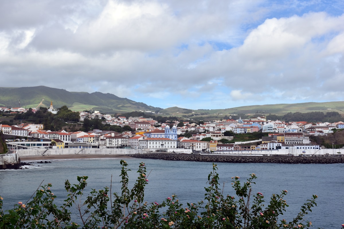 a view of a city from across the water - Angra do Heroísmo, Portugal