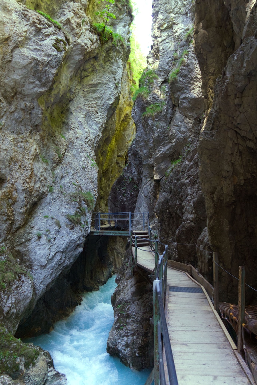 Best Day Trips From Munich, bridge under rock formation during daytime