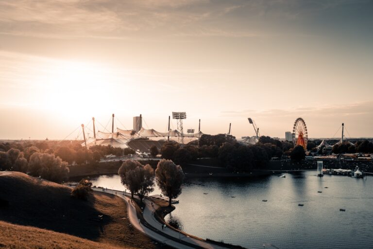 Best Free Things To Do In Munich, high-angle photo of carnival beside body of water