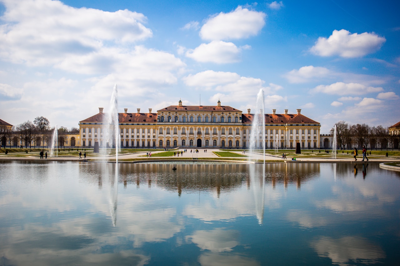Best Free Things To Do In Munich, body of water near white and brown concrete building during daytime