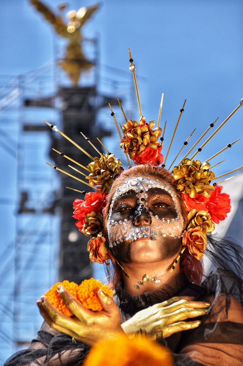 Stunning portrait of a woman with Day of the Dead makeup at Angel of Independence, Mexico City.