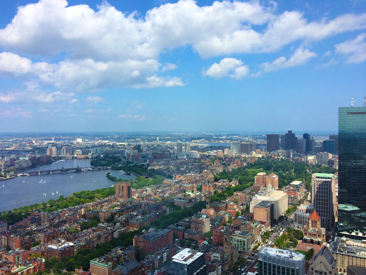 city buildings under blue sky during daytime