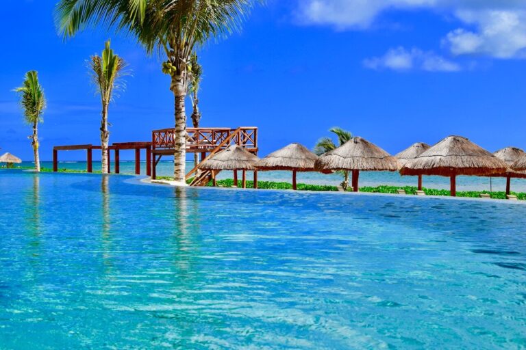 assorted wooden hut near body of water